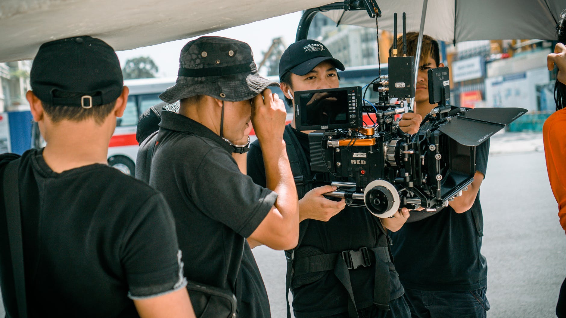 photo of camera crew standing near each other